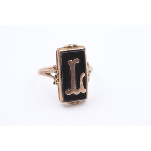 59 - 9ct rose gold antique gothic letter L mounted onyx set panel ring (2.8g) Size  P  - AS SEEN - MISSHA... 