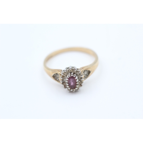 60 - 9ct gold diamond & ruby oval cluster ring (2.8g) Size  P