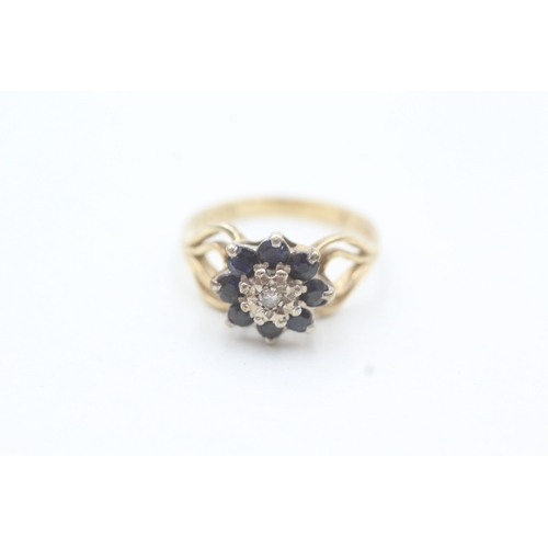 64 - 9ct gold diamond & sapphire floral cluster ring with split shank (2.8g) Size  M