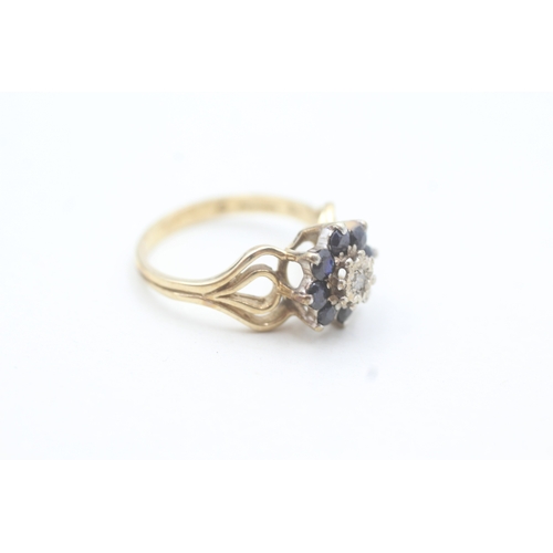 64 - 9ct gold diamond & sapphire floral cluster ring with split shank (2.8g) Size  M