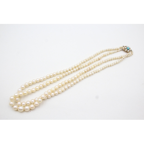 7 - 9ct gold split pearl & turquoise clasp cultured pearl double strand necklace (31.9g)