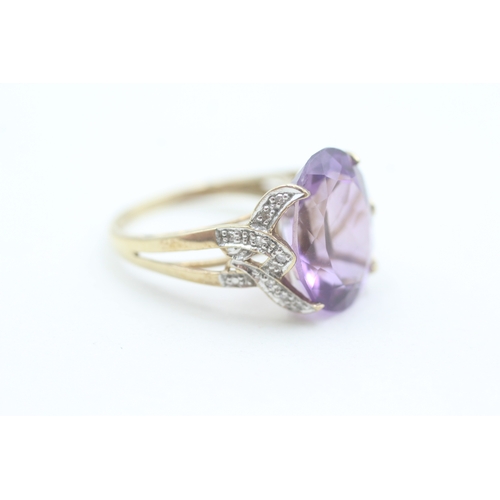 79 - 9ct gold diamond accented amethyst set cocktail ring (3g) Size  O