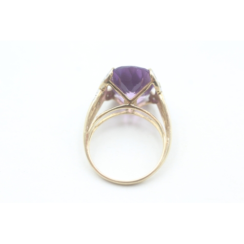 79 - 9ct gold diamond accented amethyst set cocktail ring (3g) Size  O