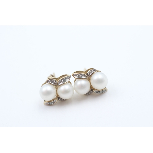 92 - 9ct gold diamond accented cultured pearl cluster stud earrings (2g)