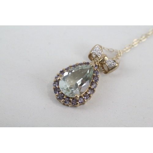 96 - 9ct gold diamond, prasiolite & iolite pendant necklace (2.6g)