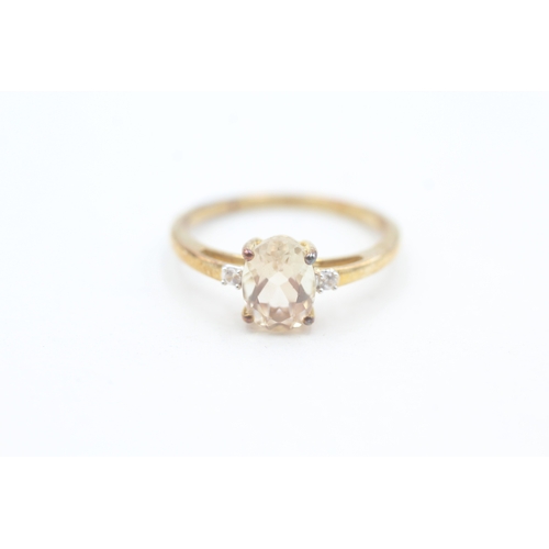 97 - 9ct gold white gemstone accented, oval cut heliodore set ring (1.8g) Size  N 1/2