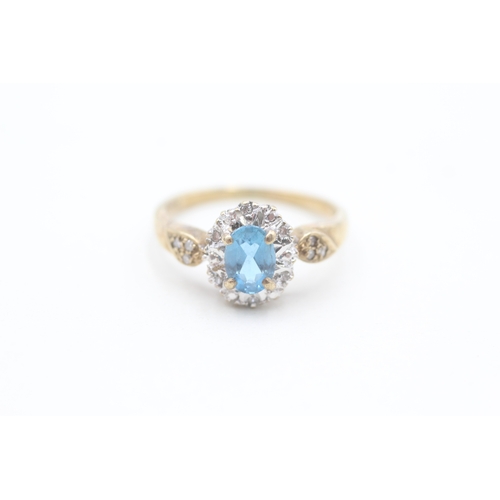 100 - 9ct gold diamond and blue topaz set cluster ring (3.2g) Size  O 1/2