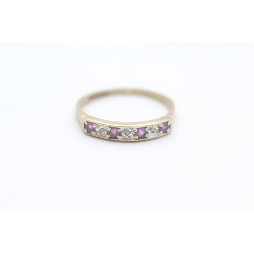 101 - 9ct gold amethyst and diamond set seven stone eternity ring (1.5g) Size  M