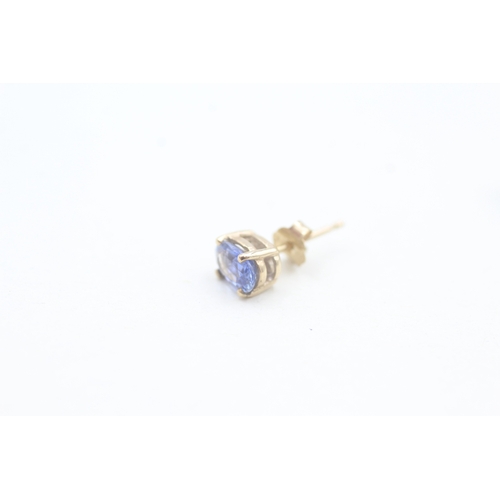 103 - 9ct gold oval cut sapphire set stud earrings (1g)