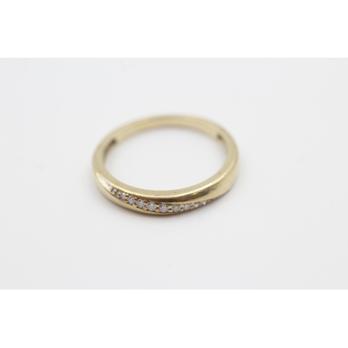 108 - 9ct gold diamond set band ring (1.9g) Size  M 1/2