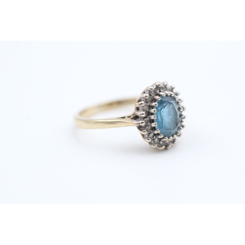 114 - 9ct gold diamond and blue topaz set cluster cocktail ring (3.1g) Size  M