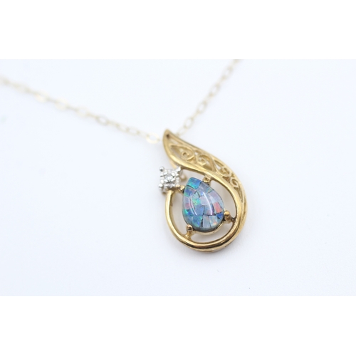 117 - 9ct gold opal triplet mosaic and diamond teardrop shaped pendant necklace (1.5g)