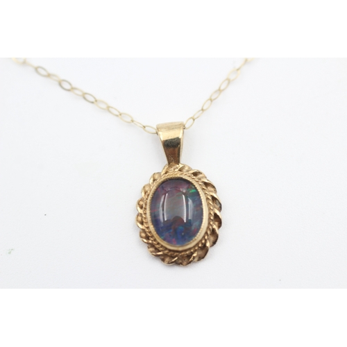 118 - 9ct gold opal triplet set pendant necklace (1.6g)