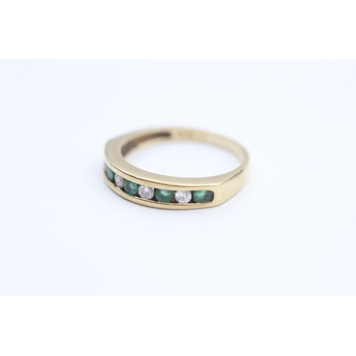 120 - 9ct gold channel set emerald and diamond set nine stone eternity ring (1.9g) Size  K