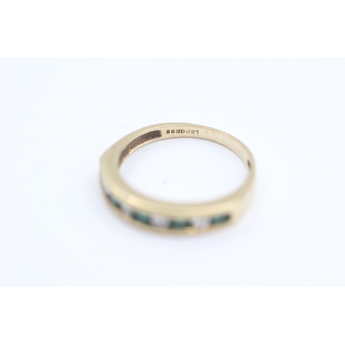 120 - 9ct gold channel set emerald and diamond set nine stone eternity ring (1.9g) Size  K