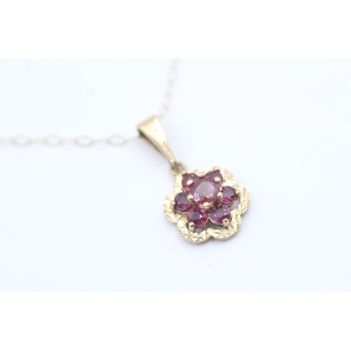 123 - 9ct gold ruby set cluster pendant necklace (1.8g)