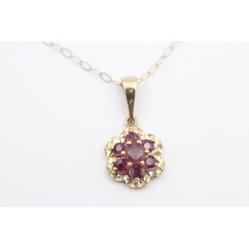 123 - 9ct gold ruby set cluster pendant necklace (1.8g)