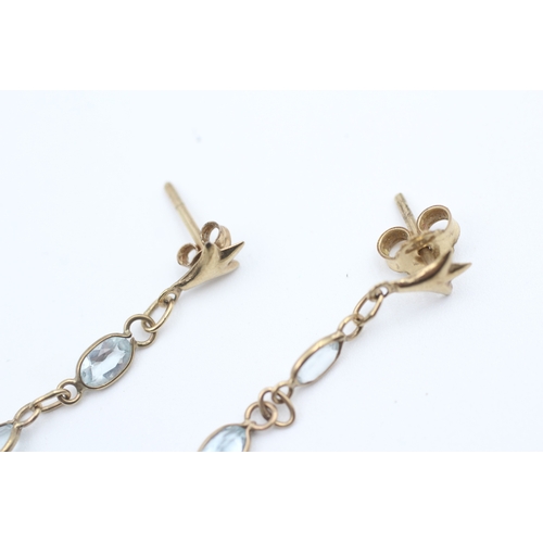 124 - 9ct gold oval cut topaz set drop earrings (0.9g)