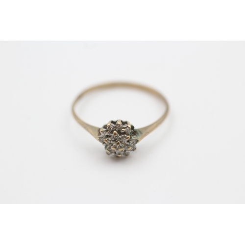 129 - 9ct gold diamond cluster ring (1.3g) Size  P