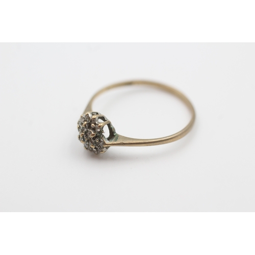 129 - 9ct gold diamond cluster ring (1.3g) Size  P