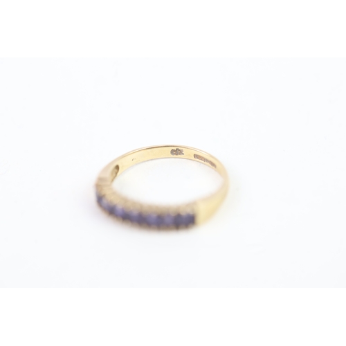 136 - 9ct gold square cut iolite set even stone eternity ring (1.4g) Size  K 1/2