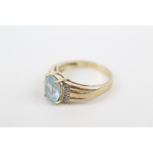 140 - 9ct gold diamond accented blue topaz set cocktail ring (3.2g) Size  M