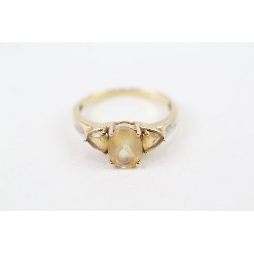 141 - 9ct gold diamond accented citrine aet trilogy ring (2.2g) Size  N