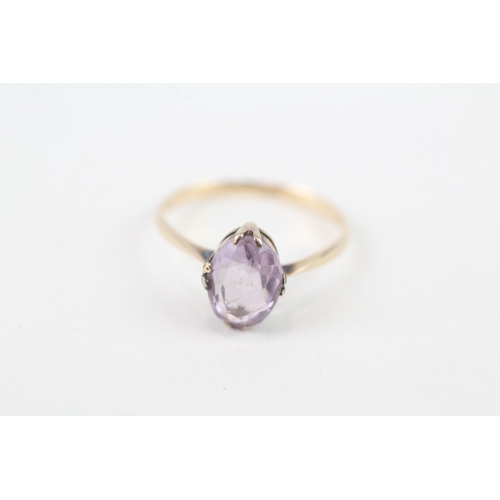 142 - 9ct gold vintage claw set oval cut amethyst solitaire ring (1.4g) Size  M