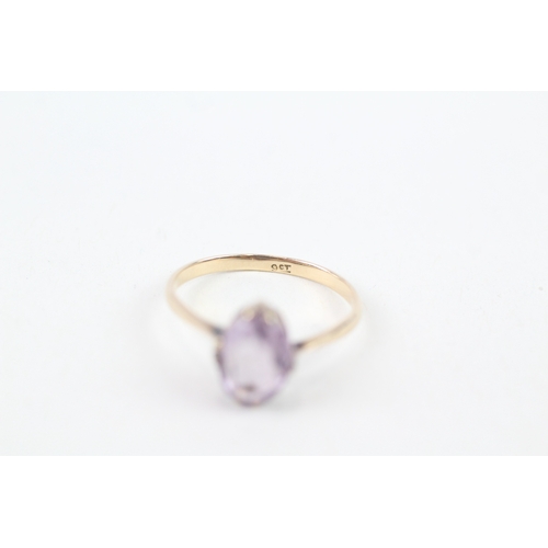 142 - 9ct gold vintage claw set oval cut amethyst solitaire ring (1.4g) Size  M