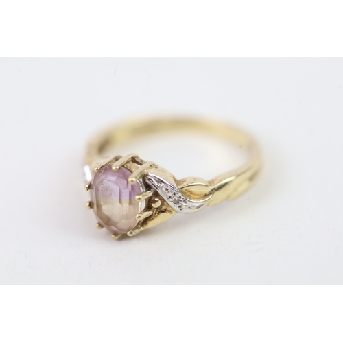 144 - 9ct gold diamond accented amethyst set dress ring (2.2g) Size  O