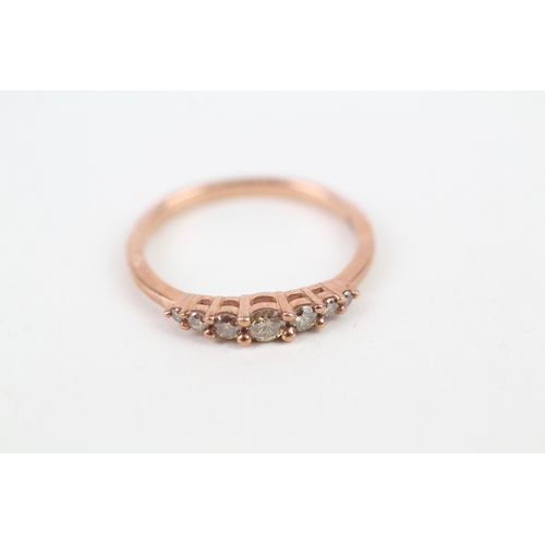 146 - 9ct rose gold cognac diamond set seven stone eternity ring (2g) Size  P 1/2