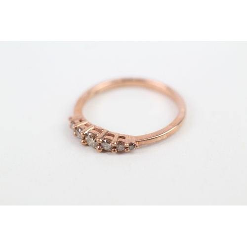 146 - 9ct rose gold cognac diamond set seven stone eternity ring (2g) Size  P 1/2