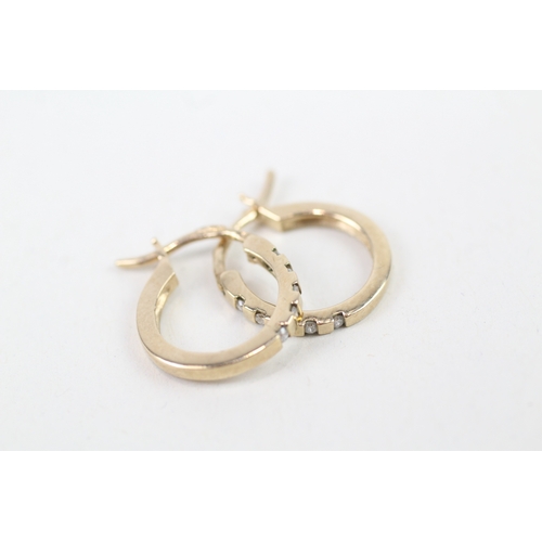 148 - 9ct gold diamond set creole hoop earrings (2.1g)