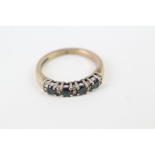 150 - 9ct gold diamond and blue topaz set half eternity ring (2.8g) Size  M