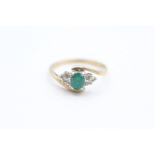 151 - 9ct gold diamond and green gemstone set dress ring (1.9g) Size  M