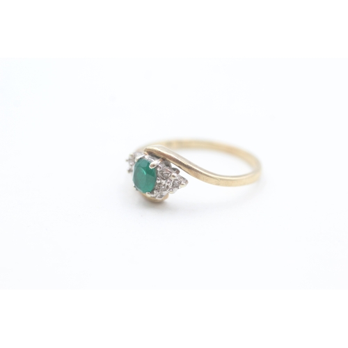 151 - 9ct gold diamond and green gemstone set dress ring (1.9g) Size  M