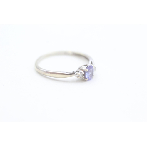 153 - 9ct gold diamond and tanzanite set dress ring (1.3g) Size  O