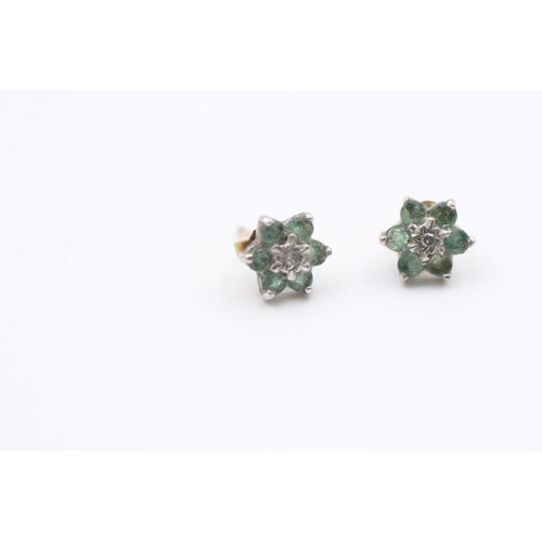 154 - 9ct gold emerald and diamond floral cluster stud earrings (0.9g)