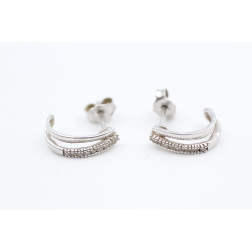 155 - 9ct white gold diamond set half hoop stud earrings (1.5g)