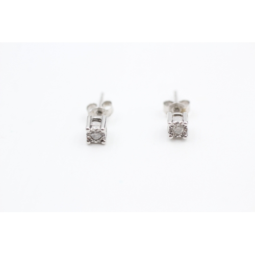 168 - 9ct white gold illusion set diamond stud earrings (0.8g)