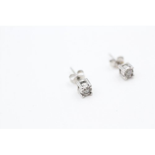 168 - 9ct white gold illusion set diamond stud earrings (0.8g)