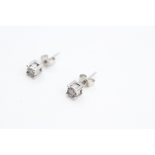 168 - 9ct white gold illusion set diamond stud earrings (0.8g)