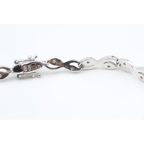 171 - 9ct white gold diamond set fancy station bracelet (8.1g)