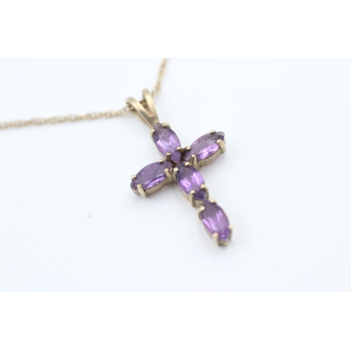 173 - 9ct gold oval cut amethyst set cross pendant necklace (1.8g)