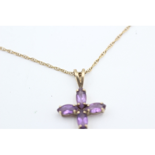 173 - 9ct gold oval cut amethyst set cross pendant necklace (1.8g)