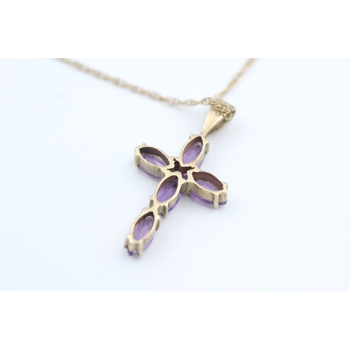 173 - 9ct gold oval cut amethyst set cross pendant necklace (1.8g)