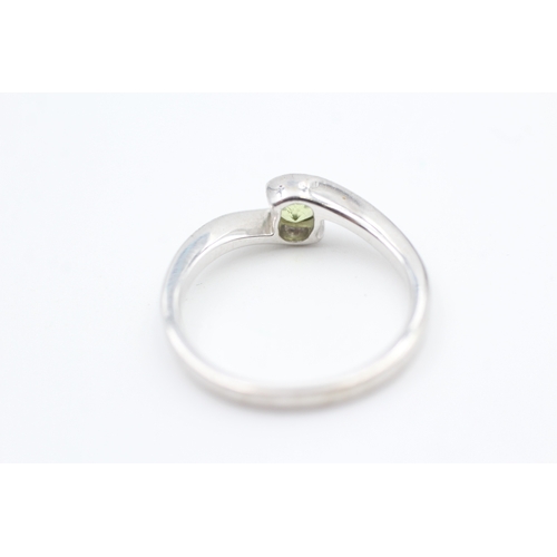 180 - 9ct white gold peridot set solitaire ring (2.6g) Size  N