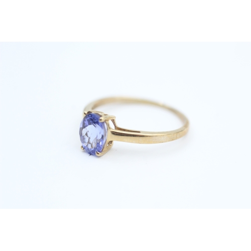 181 - 9ct gold oval cut tanzanite set solitaire ring (1.5g) Size  N 1/2