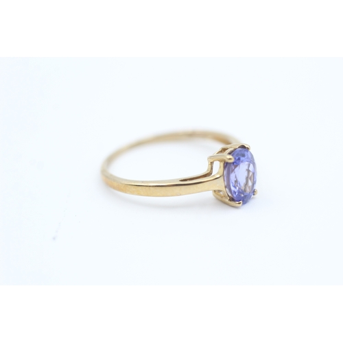 181 - 9ct gold oval cut tanzanite set solitaire ring (1.5g) Size  N 1/2