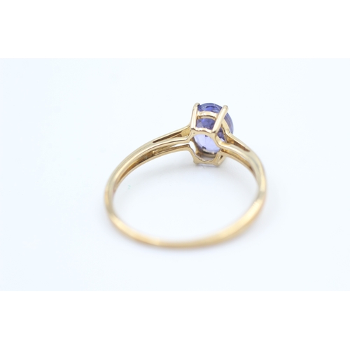 181 - 9ct gold oval cut tanzanite set solitaire ring (1.5g) Size  N 1/2